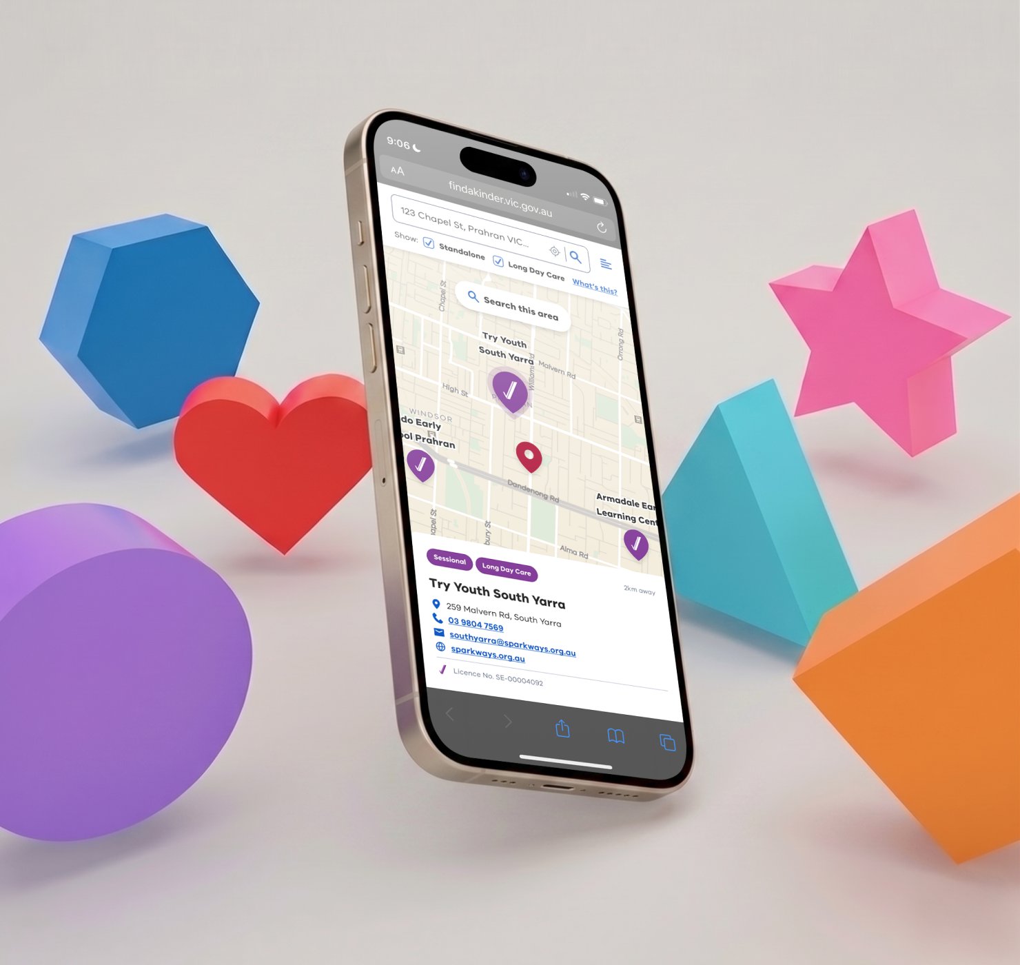 Find a Kinder Victorian Government kindergarten search shown on iPhone alongside playful 3D shapes